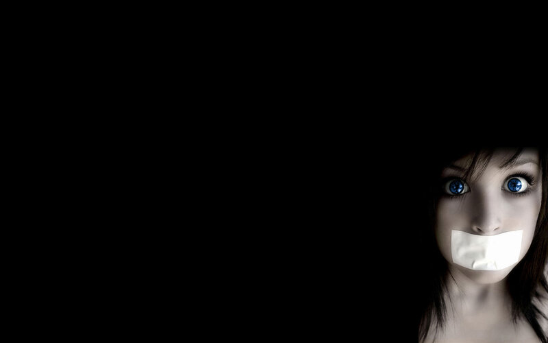 Woman with Tape over Mouth — Black, Dramatic, Photograph, Blue Eyes