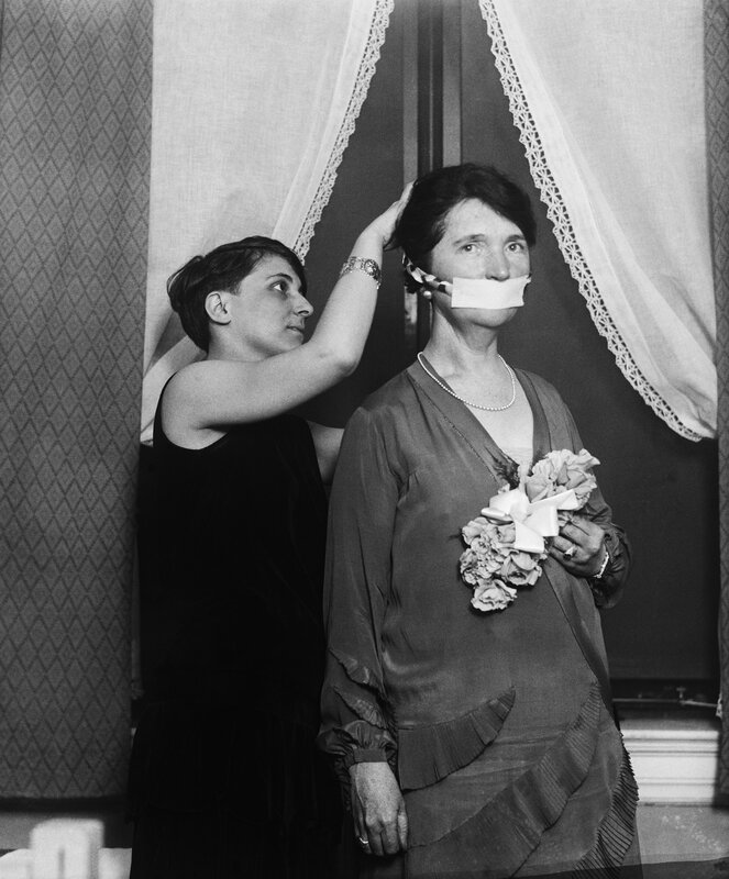 Woman with Tape over Mouth — Black, Dramatic, Photograph, Flowers
