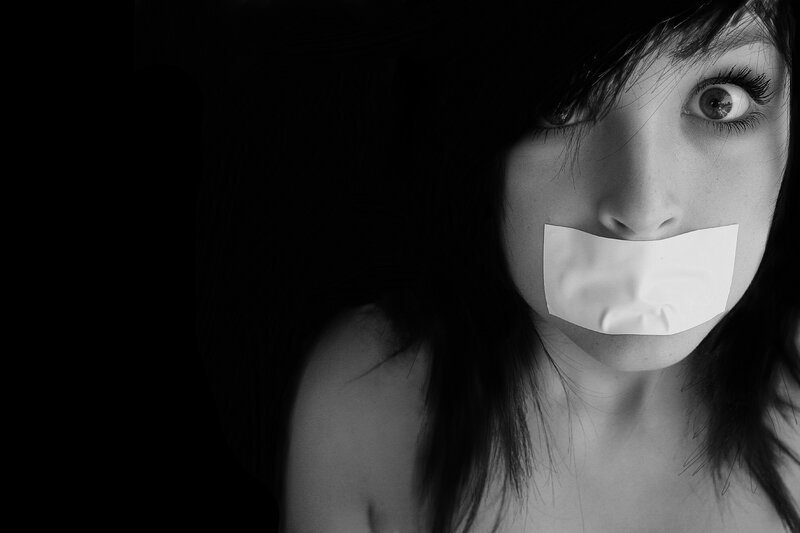 Woman with Tape over Mouth — Black, Dramatic