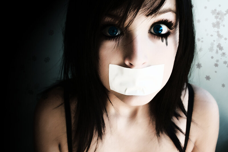 Woman with Tape over Mouth — White, Dramatic, Photograph, Blue Eyes