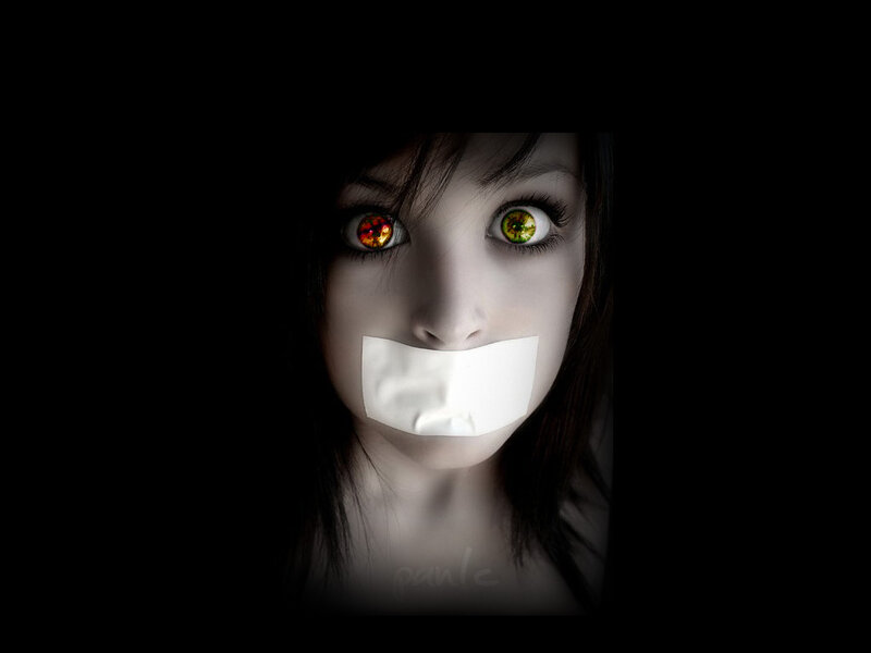 woman with taped mouth