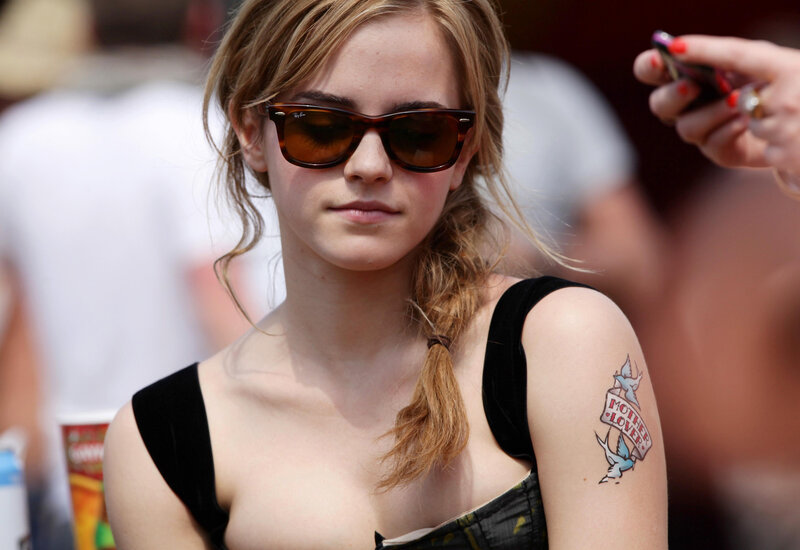 woman with tattoo and sunglasses