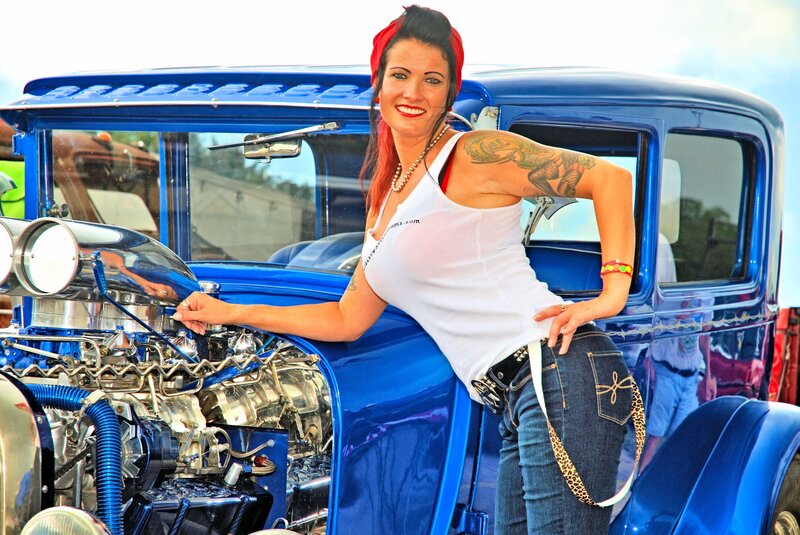 Woman with Tattoo by Car