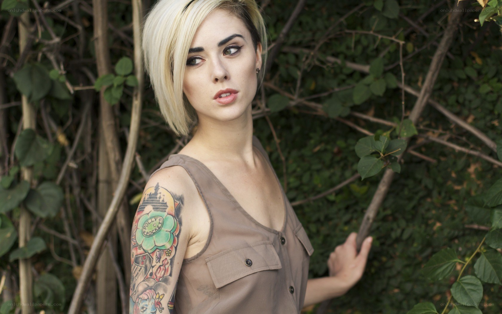 woman with tattoo in garden