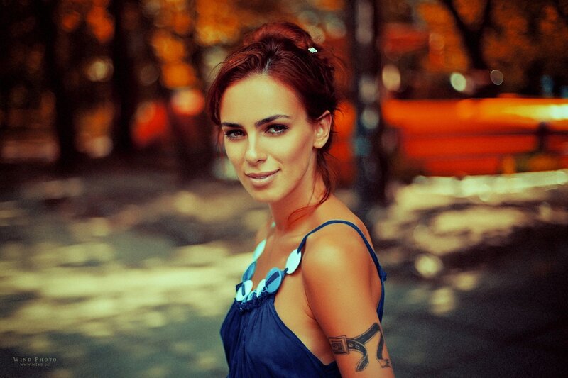 Woman with Tattoo in Park