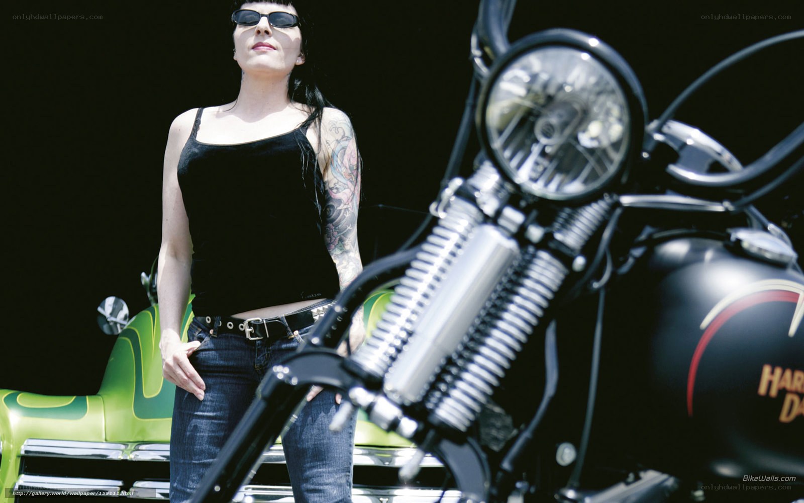 woman with tattoo near motorcycle