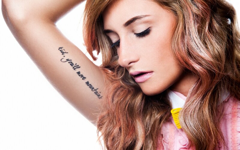 woman with tattoo on arm