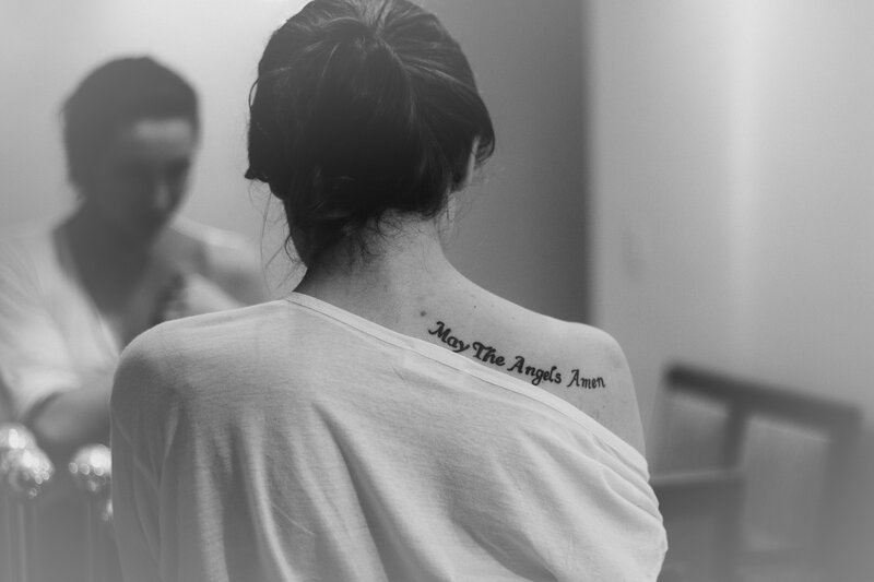 woman with tattoo on back
