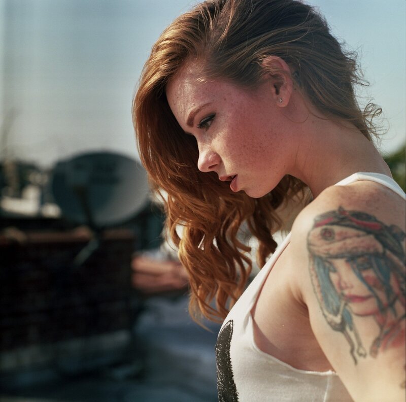 woman with tattoo on shoulder