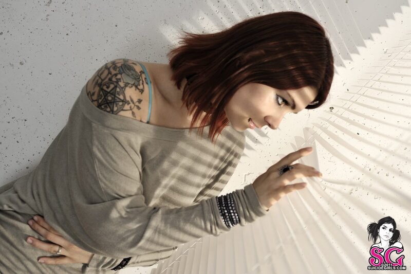 woman with tattoo on shoulder