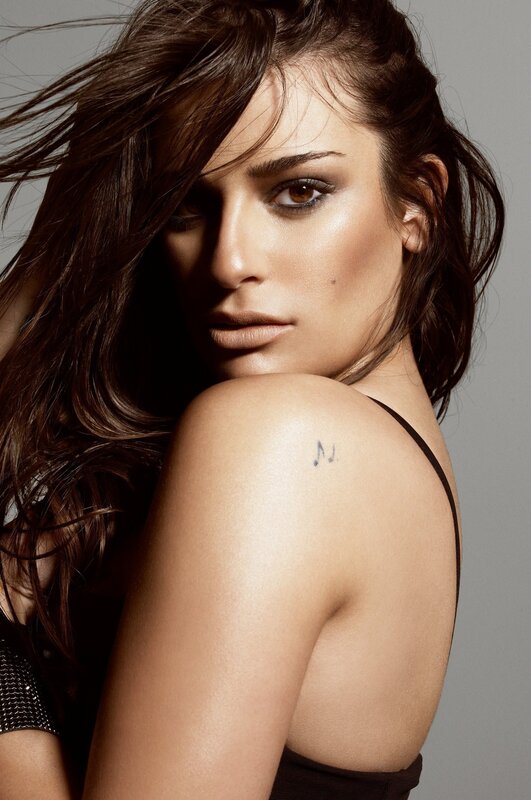 woman with tattoo on shoulder