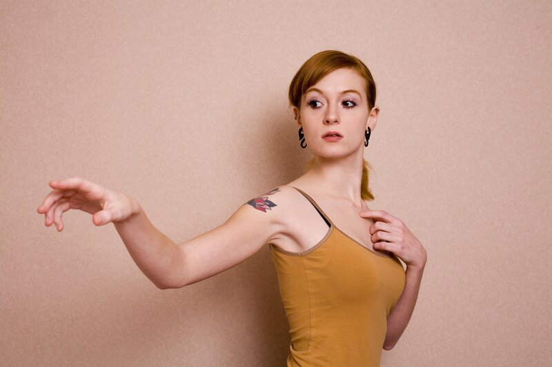 woman with tattoo posing