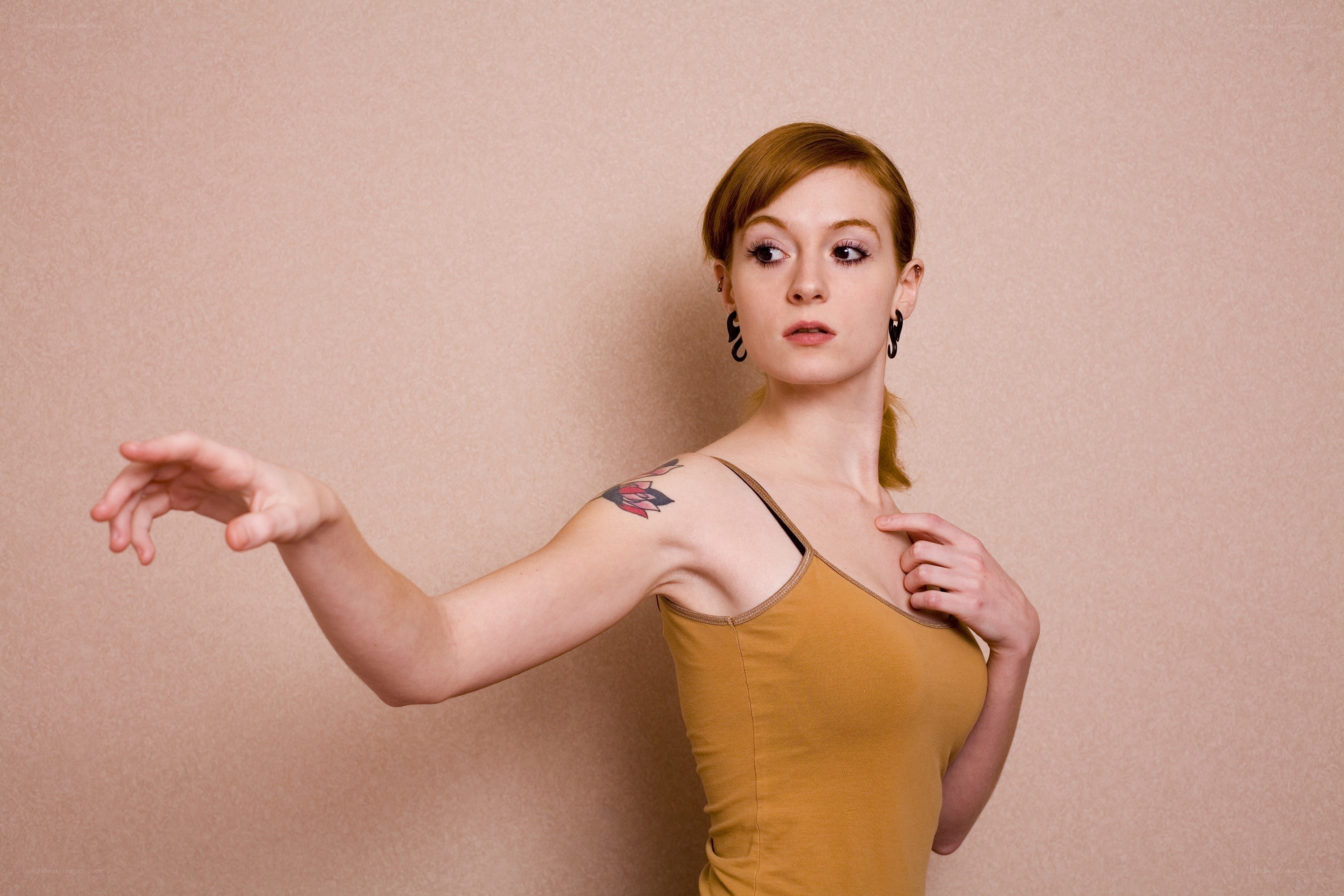 woman with tattoo posing
