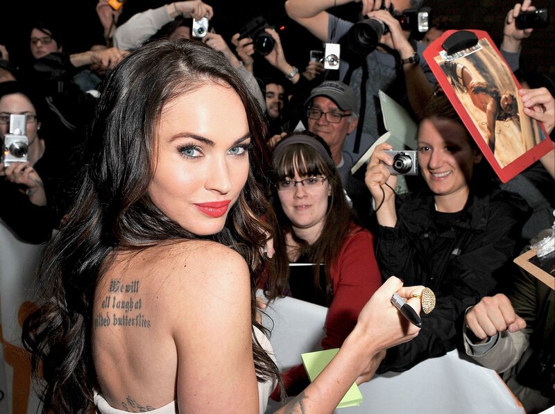 Woman with Tattoo Signing