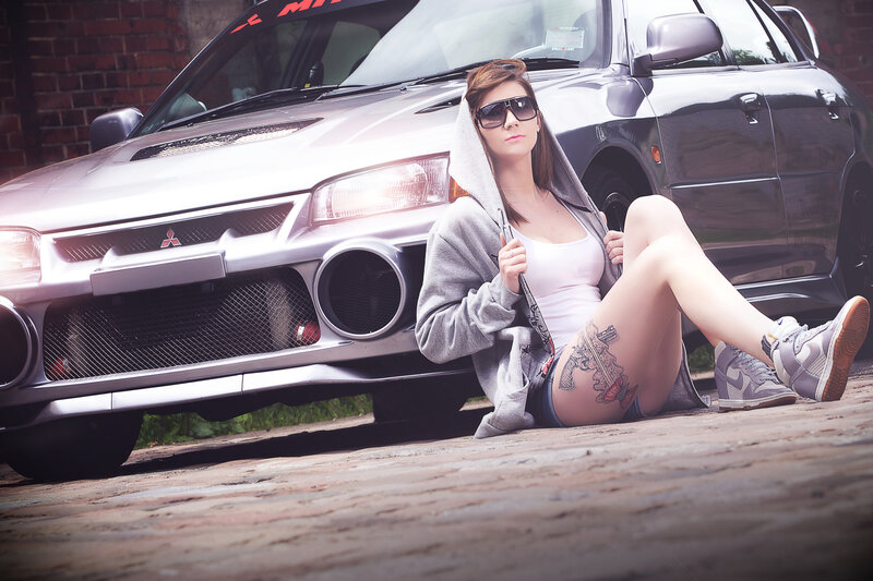 Woman with Tattoo Sitting — Gray