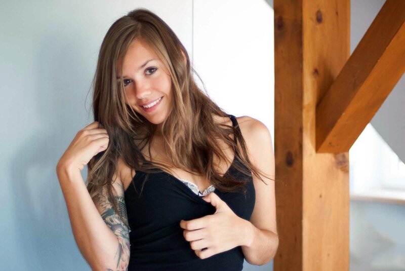 woman with tattoo smiling