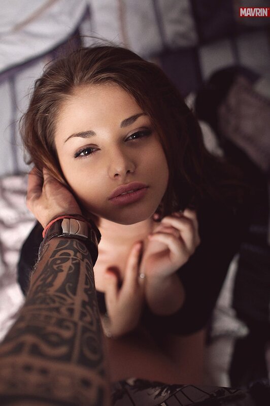 woman with tattooed arm