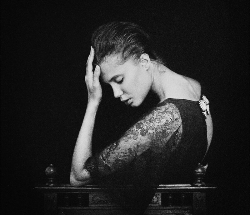 Woman with Tattooed Arm — Black