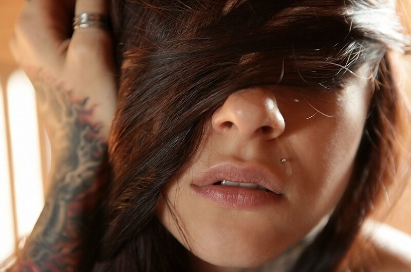 Woman with Tattooed Arm — Brown, Intimate