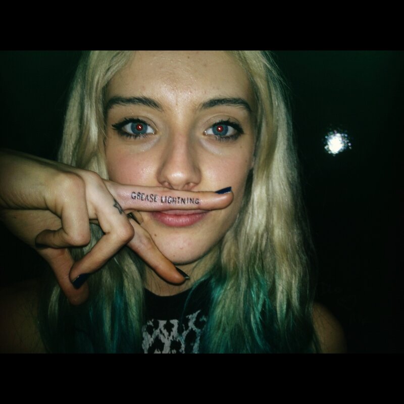 Woman with Tattooed Finger
