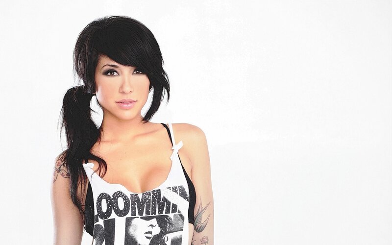 woman with tattoos and black hair