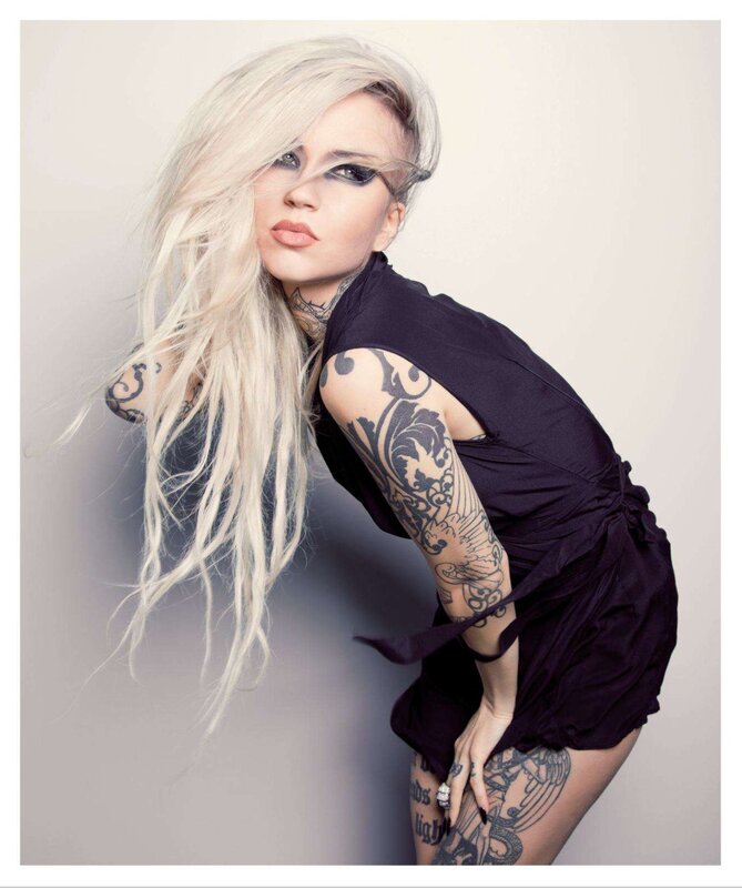 woman with tattoos and blonde hair