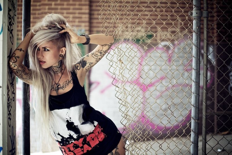 Woman with Tattoos and Blonde Hair