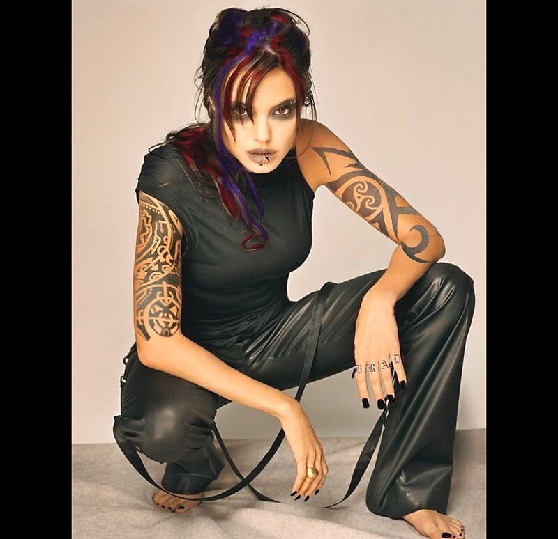 woman with tattoos and colorful hair