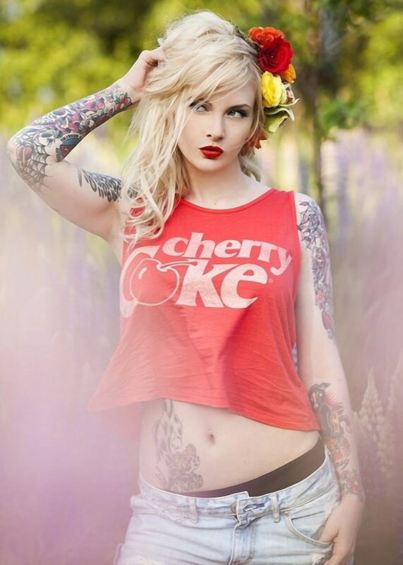 Woman with tattoos and flowers