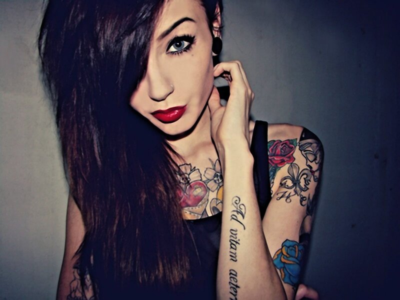 woman with tattoos and makeup