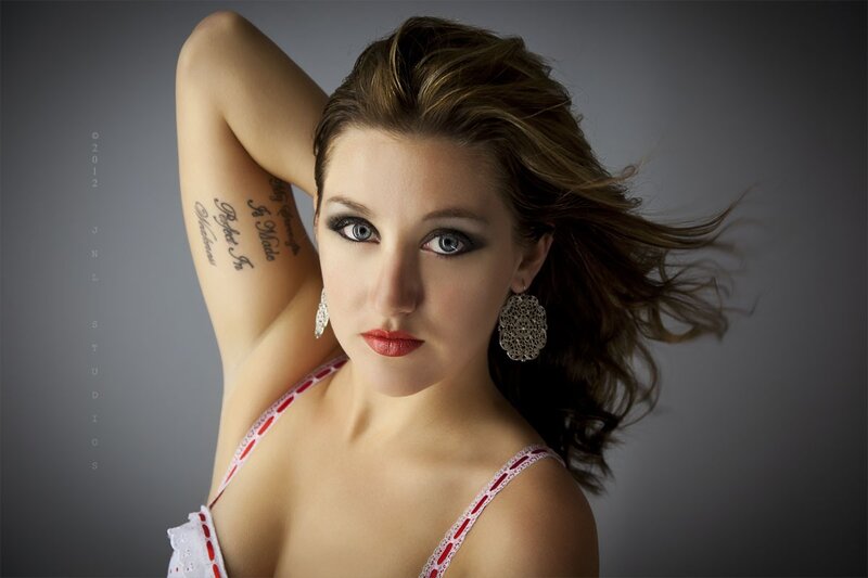 woman with tattoos and makeup