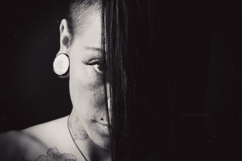 woman with tattoos and piercings