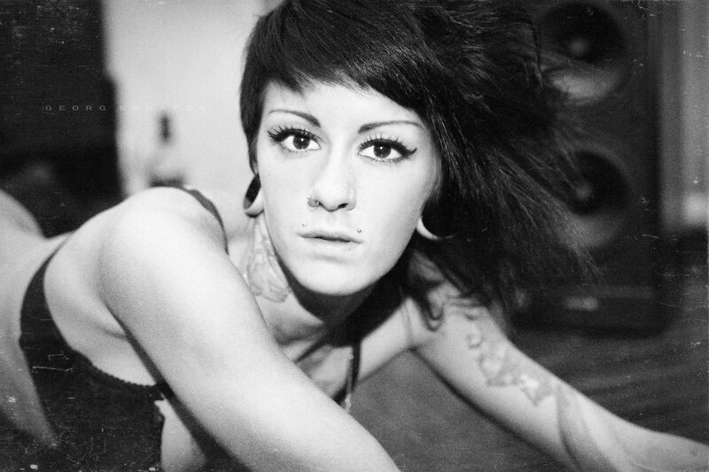 woman with tattoos and piercings