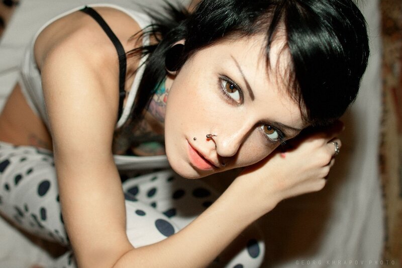 woman with tattoos and piercings