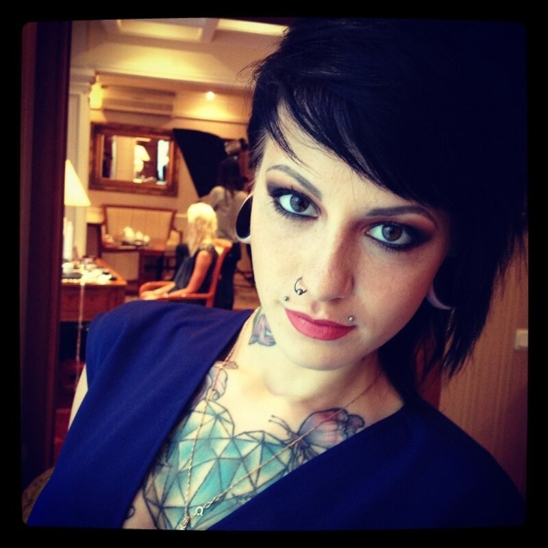 woman with tattoos and piercings