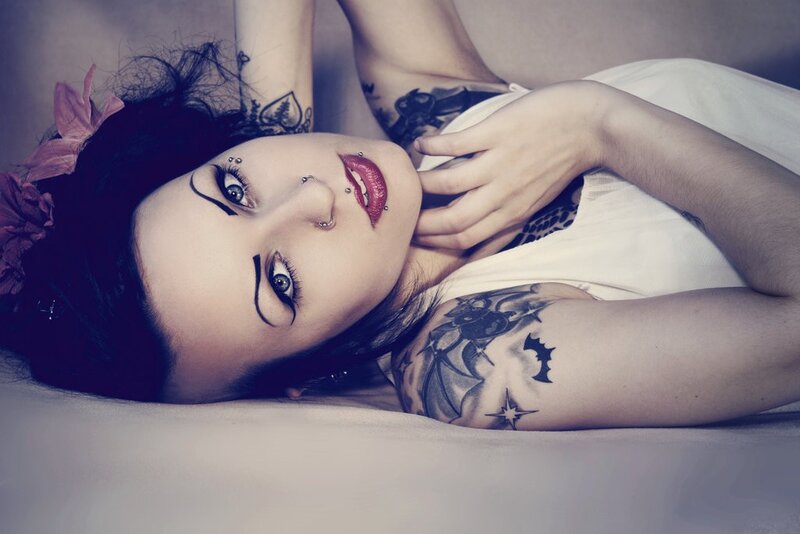 woman with tattoos and piercings
