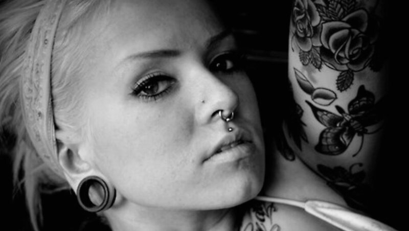 Woman with Tattoos and Piercings — Black