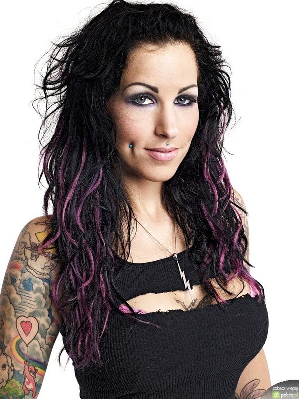 woman with tattoos and purple hair