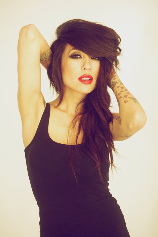 woman with tattoos and red lipstick