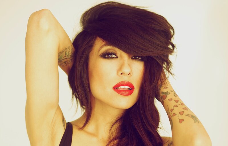 woman with tattoos and red lipstick