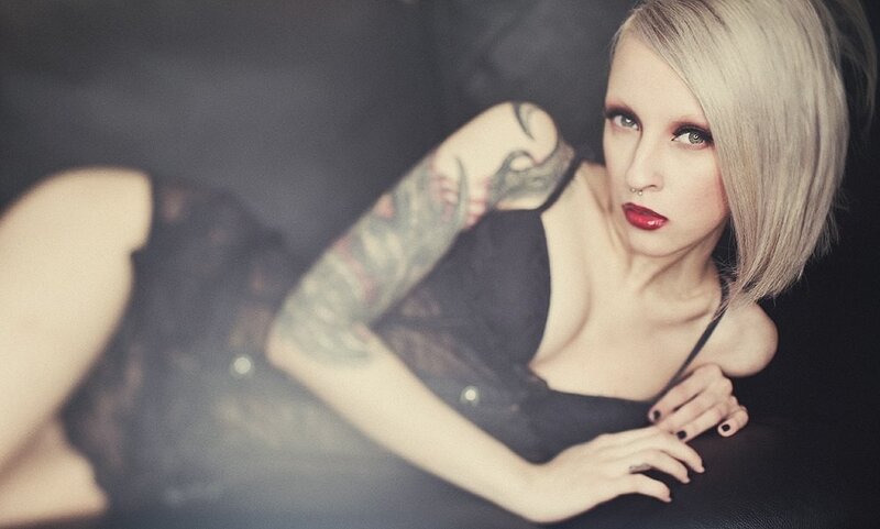 woman with tattoos and red lipstick