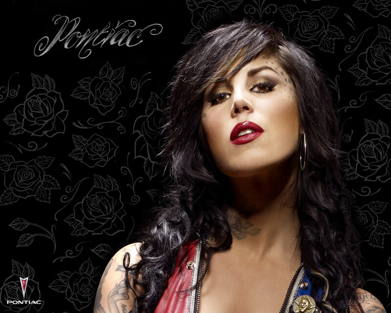 Woman with tattoos and red lipstick