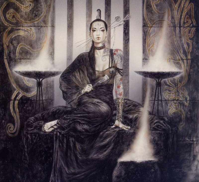 woman with tattoos and ritual objects