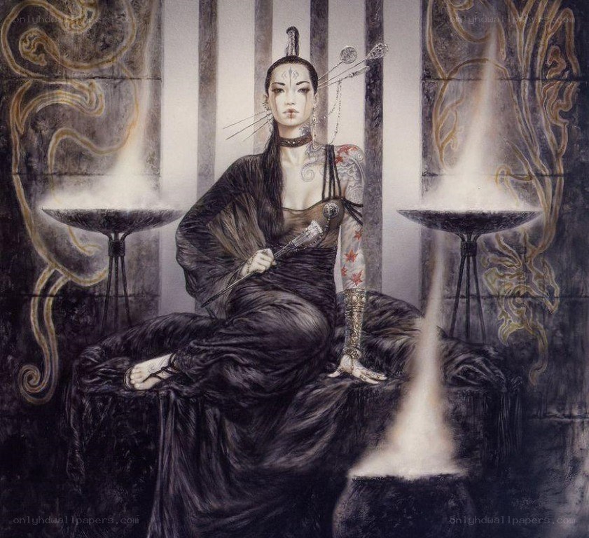 woman with tattoos and ritual objects