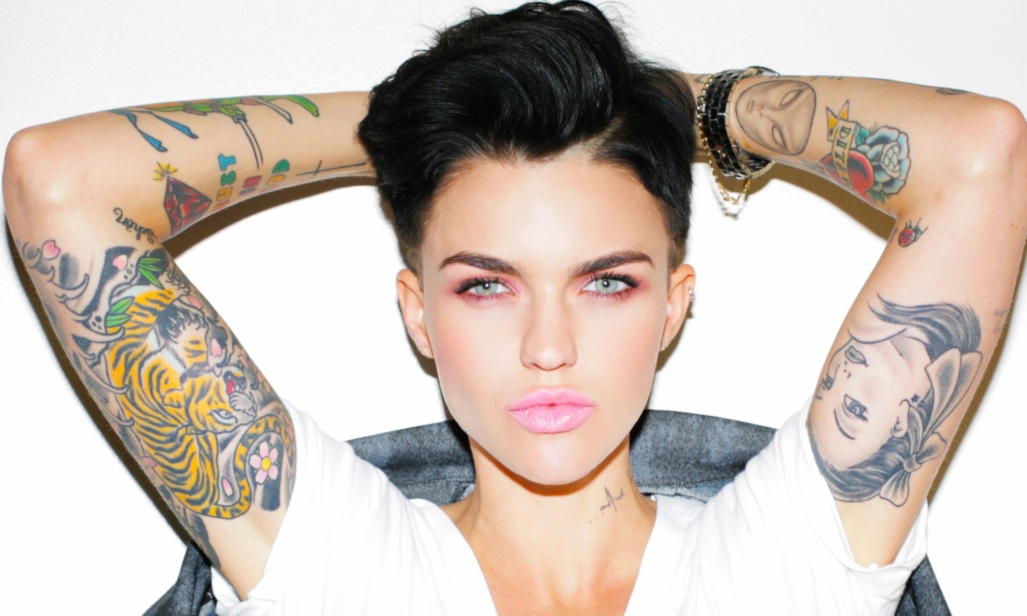 woman with tattoos and short hair