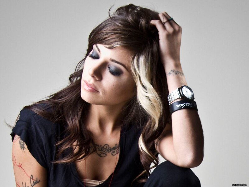 woman with tattoos and watch