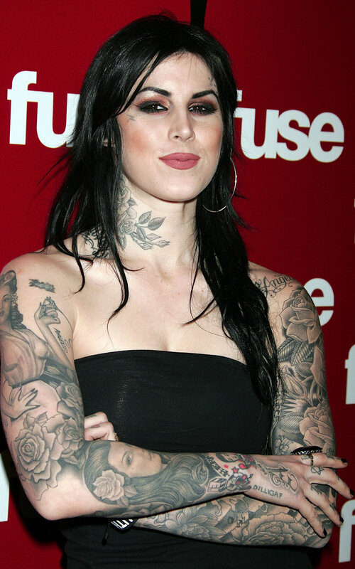 woman with tattoos at event