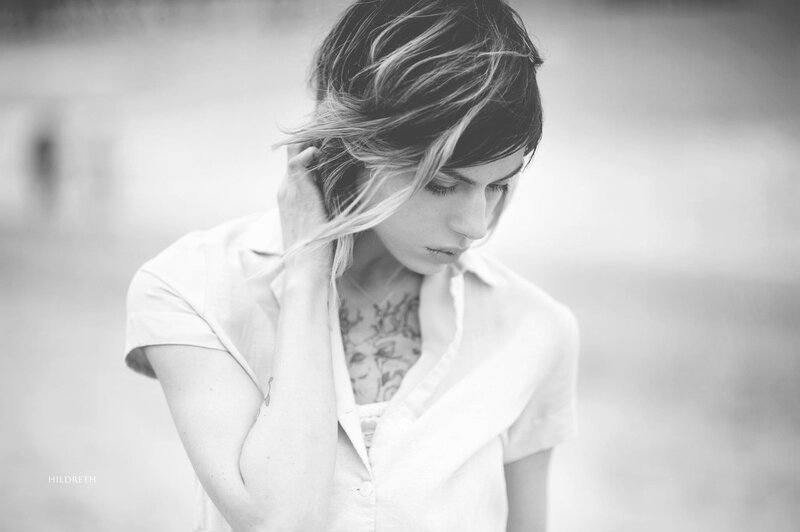 Woman with Tattoos — Black, Contemplative, Photograph, Tattoo