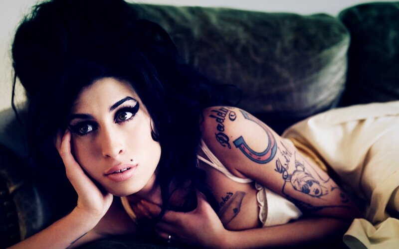 Woman with Tattoos — Black, Dramatic, Photograph, Couch