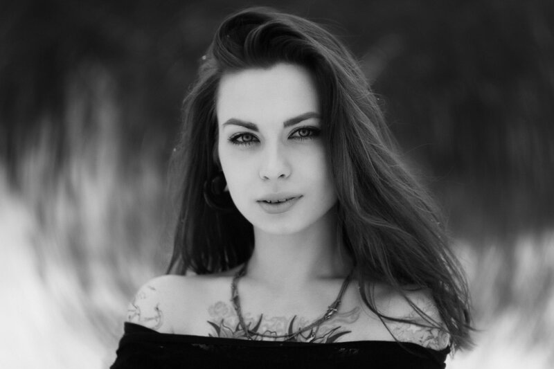 Woman with Tattoos — Black, Dramatic, Photograph, Necklace, Long Hair